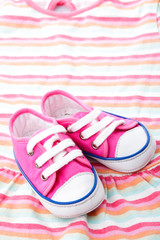 Fototapeta premium Pink baby shoes