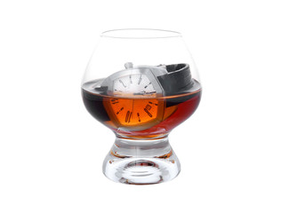 Watch in glass with cognac