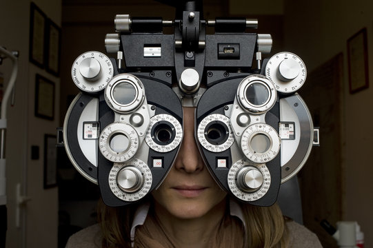 Optometrist Diopter With Girl.