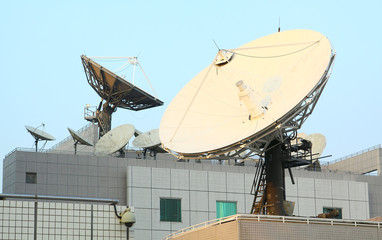 Satellite Communications Dishes on top of TV Station