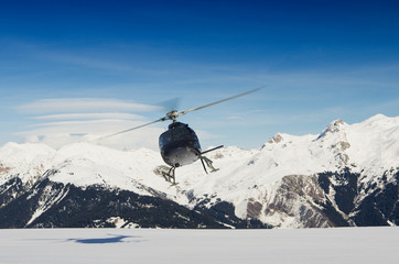 Mountain rescue helicopter in flight © jon11