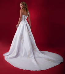 Fiancee in long white bridal  dress