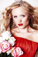 Fototapeta na wymiar Portrait of a beautiful woman in red dress