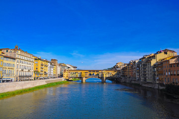 Bringes and houses on Arno river in Florence.