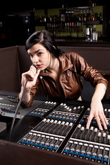 Soundboard technician doing a sound check