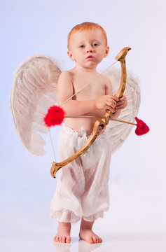Baby cupid with arrow and bow