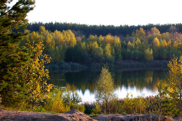 Colorful autumn trees fortress at the river front