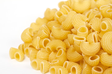 close up of a dried italian pasta on white background