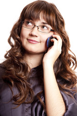 Business women calling by phone. Studio shot.