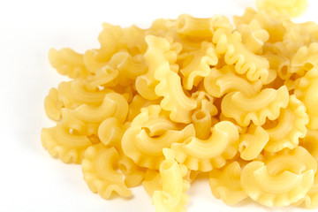 dried italian pasta on white background