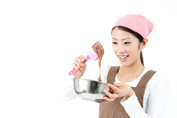 attractive asian woman cooking