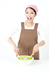 attractive asian woman cooking