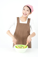 attractive asian woman cooking
