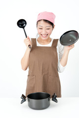 attractive asian woman cooking