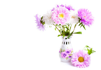 Naklejka na ściany i meble Beautiful colourful bouquet of flowers in a vase.