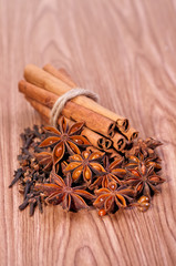 Spices on wood background