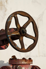 Obraz premium pipe with valve in wall