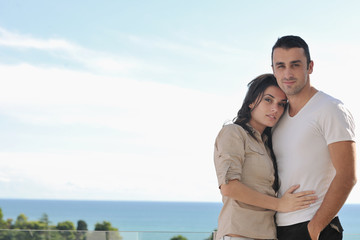 Obraz premium couple relaxing on balcony