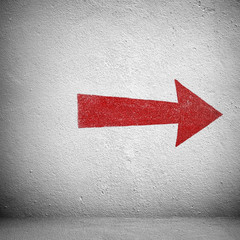 red arrow on white wall