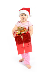 baby girl in a red Santa Claus hat