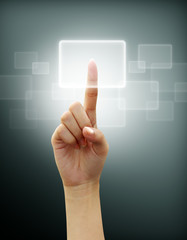 hand of woman presses the button screen