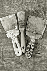 Different tools on a wooden background.