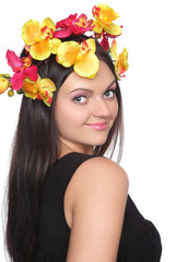 Naklejka premium Pretty woman with flowers on head
