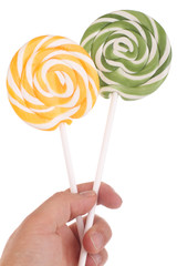 Lutscher in der Hand