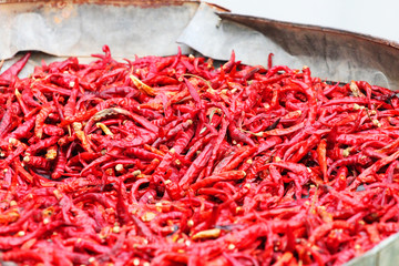 Chilies drying in the sun in Thailand.