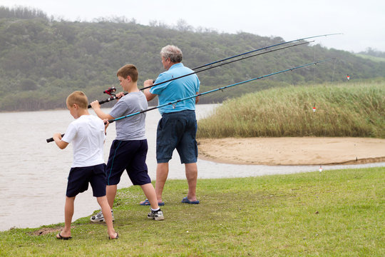 grandsons fishing with their grandpa