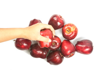 hand holding red apple