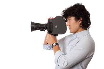 young asian man holding old camera