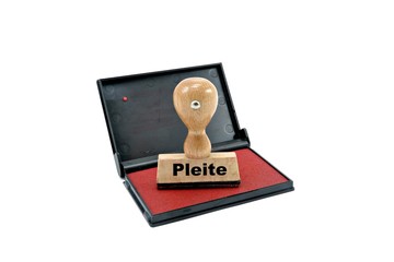 Ink pad and stamp with pleite bankrupt written in German