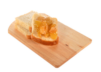 Bread with jam  on a board