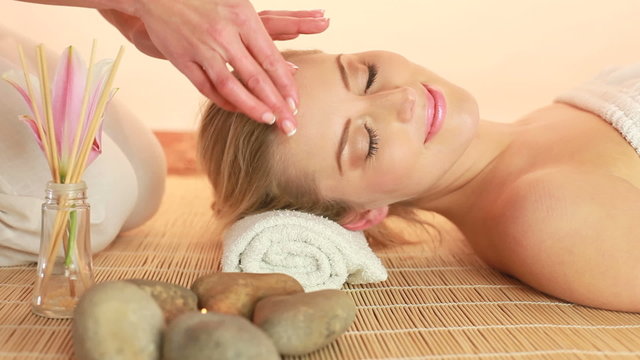 woman getting massage at spa