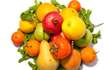 a lot of different fruits and green leaves