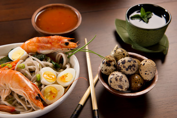 Bowl of Noodles with seafood & tea