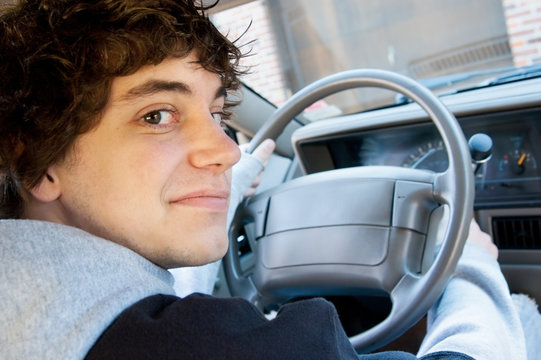 Teen Boy Driver Behind The Wheel