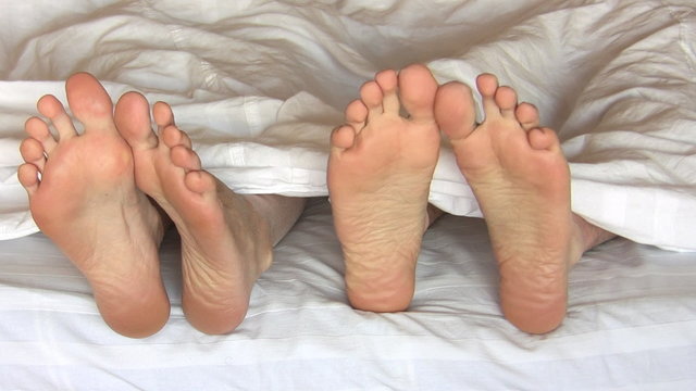 Foots under blanket