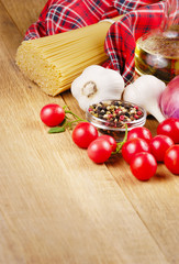 Raw pasta,vegetables, oil and spices