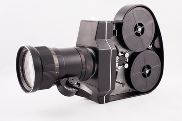 old cinema camera on a white