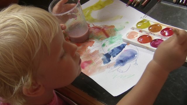 Child draws paint