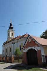 Naklejka premium Kirche und Kutschenhaus
