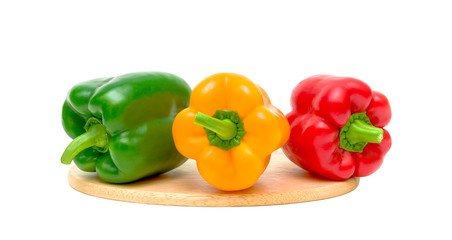 Ripe peppers on white background