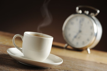Alarm clock and coffee cup