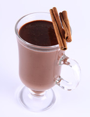 Cup of hot chocolate with cinnamon sticks