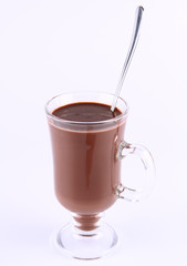 Cup of hot chocolate with a spoon