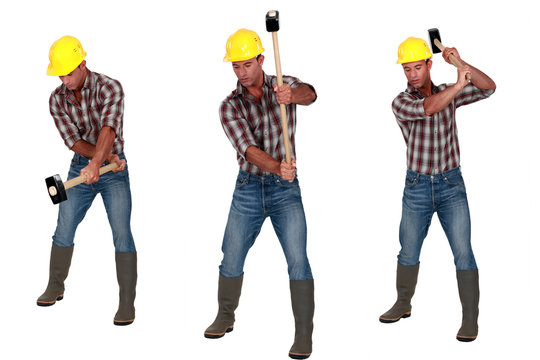 Man using sledge-hammer