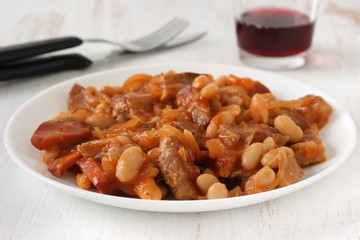 meat with sausages and beans