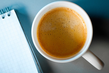 cup of coffee and notebook